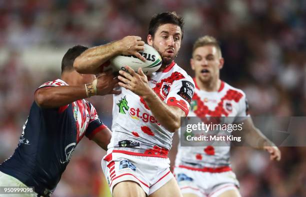 Ben Hunt of the Dragons is tackled during the round eight NRL match between the St George Illawara Dragons and Sydney Roosters at Allianz Stadium on...