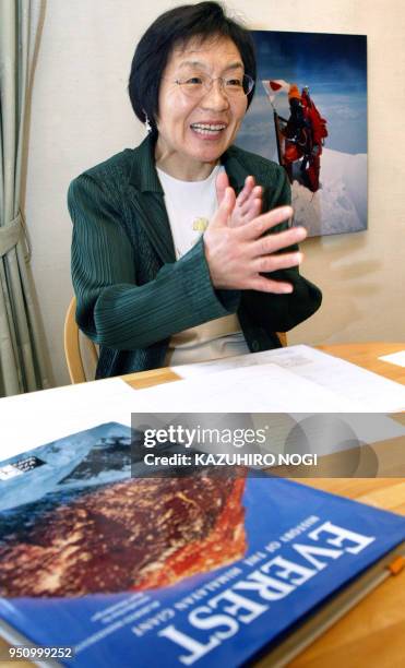 Japanese Junko Tabei, the first woman in the world to reach the summit of Mount Everest on 16 May 1975, smiles as she speaks during an interview with...