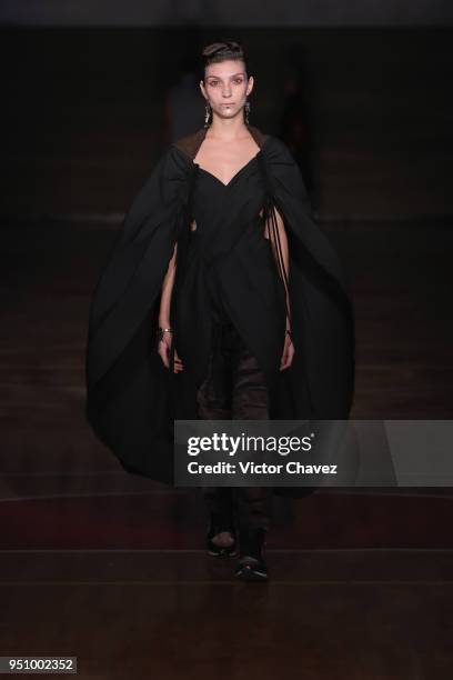 Model walks the runway during the Malafacha show at Mercedes Benz Fashion Week Mexico Fall/Winter 2018 on April 24, 2018 in Mexico City, Mexico.