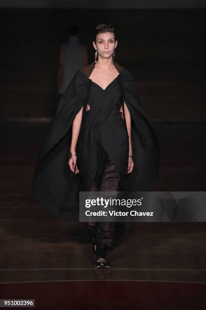 Model walks the runway during the Malafacha show at Mercedes Benz Fashion Week Mexico Fall/Winter 2018 on April 24, 2018 in Mexico City, Mexico.