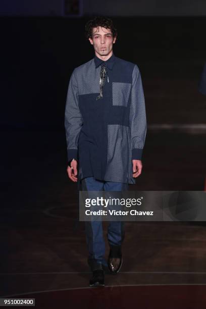 Model walks the runway during the Malafacha show at Mercedes Benz Fashion Week Mexico Fall/Winter 2018 on April 24, 2018 in Mexico City, Mexico.