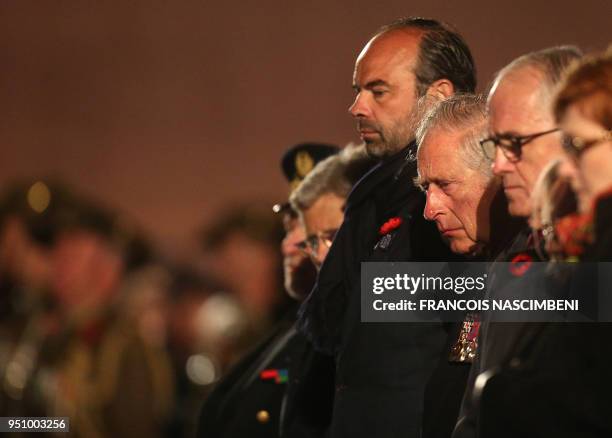 Britain's Prince Charles and French Prime Minister Edouard Philippe attend on April 25, 2018 ceremonies marking the 100th anniversary of ANZAC day in...