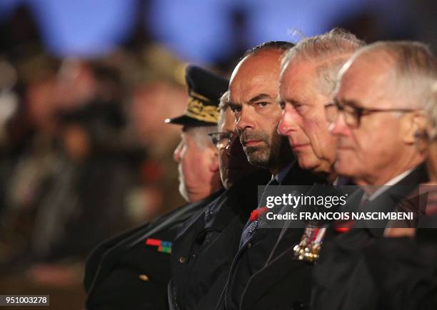Britain's Prince Charles and French Prime Minister Edouard Philippe attend on April 25, 2018 ceremonies marking the 100th anniversary of ANZAC day in...