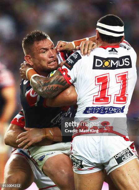 Jared Waerea-Hargreaves of the Roosters is tackled during the round eight NRL match between the St George Illawara Dragons and Sydney Roosters at...