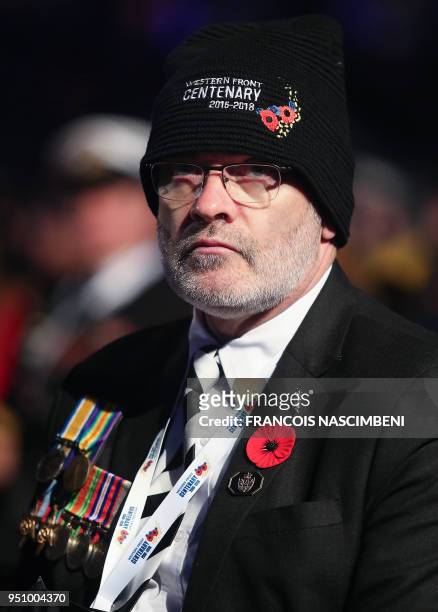 Photo taken on April 25, 2018 shows an Australian man attending ceremonies marking the 100th anniversary of ANZAC Day in Villers-Bretonneux, northern...