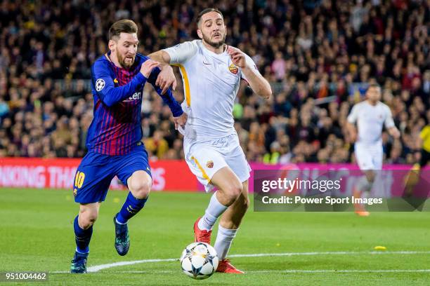 Lionel Andres Messi of FC Barcelona fights for the ball with Kostas Manolas of AS Roma during the UEFA Champions League 2017-18 quarter-finals match...