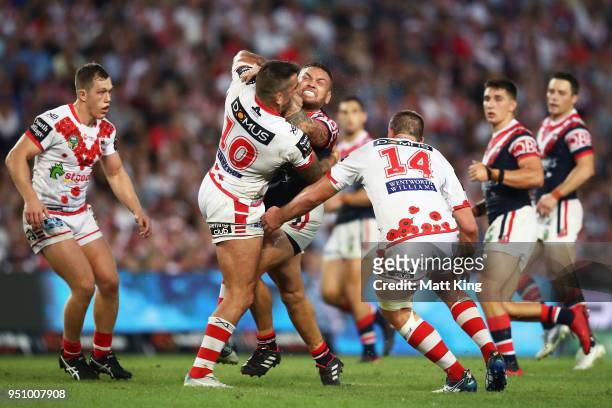Jared Waerea-Hargreaves of the Roosters is tackled during the round eight NRL match between the St George Illawara Dragons and Sydney Roosters at...