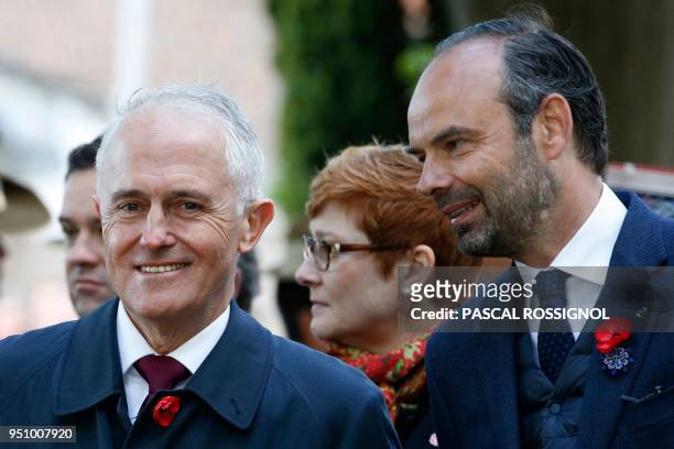 French Prime Minister Edouard Philippe and Australian Prime Minister Malcolm Turnbull attend a wreath-laying ceremony at the war memorial in...