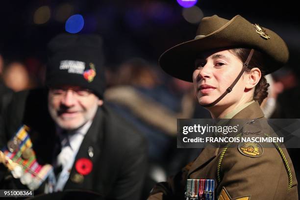 Photo taken on April 25, 2018 shows Australian visitors and soldiers attending ceremonies marking the 100th anniversary of ANZAC Day in...