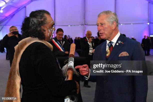 The Prince of Wales meets indigenous didgeridoo player David Dahwurr Hudson after an early morning memorial at the Villers-Bretonneux Memorial in...
