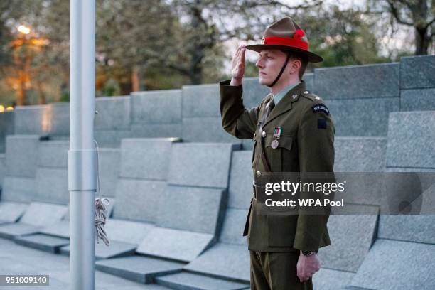 New Zealand soldier stands at the Australian War Memorial during an Anzac Day dawn service at Hyde Park Corner on April 25, 2018 in London, England....