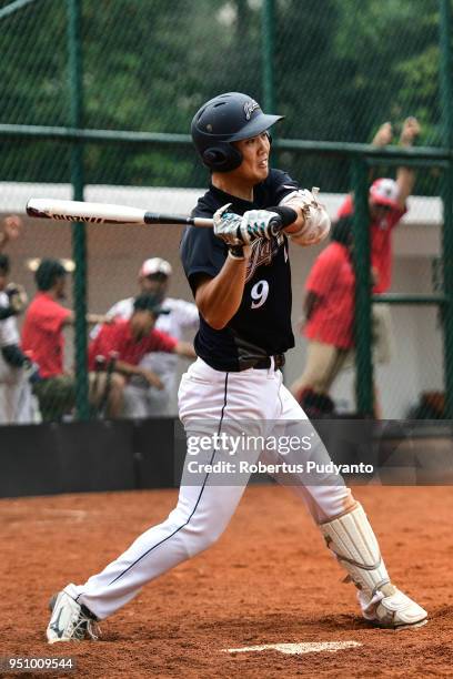 Yuto Nakajima of Japan bats during the qualification match between Indonesia and Japan in the 10th Asian Men's Softball Championship on April 25,...