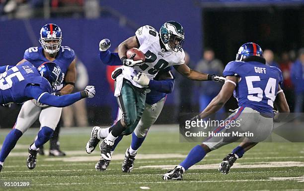 Running back LeSean McCoy of the Philadelphia Eagles carries the ball during a game against the New York Giants on December 13, 2009 at Giants...