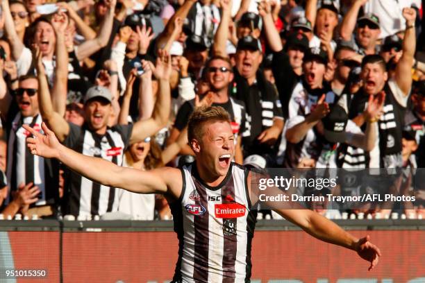 Jordan De Goey of the Magpies celebrates a goal during the round five AFL match between the Collingwood Magpies and the Essendon Bombvers at...