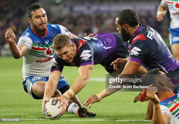 Ryan Hoffman of the Melbourne Storm scores a try during the round eight NRL match between the Melbourne Storm and New Zealand Warriors at AAMI Park...