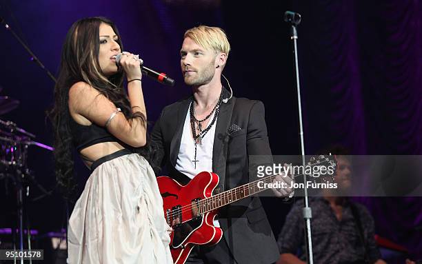 Gabriella Cilmi and Ronan Keating on stage at the O2 Rockwell concert in aid of Nordoff-Robbins Music Therapy at 02 Arena on September 11, 2009 in...