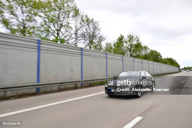 Converted Volkswagen Passat car drives as artificial intelligence takes over driving the car during tests of autonomous car abilities conducted by...