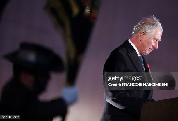 Britain's Prince Charles delivers a speech on April 25, 2018 during ceremonies marking the 100th anniversary of ANZAC day in Villers-Bretonneux,...