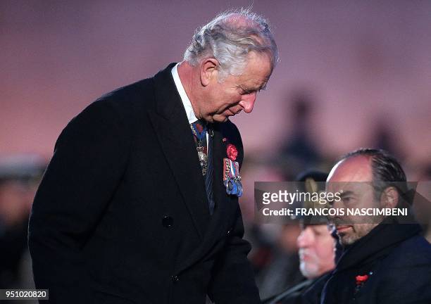 Britain's Prince Charles and French Prime Minister Edouard Philippe attend on April 25, 2018 ceremonies marking the 100th anniversary of ANZAC day in...