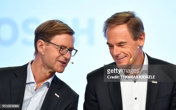 Volkmar Denner , CEO of German electronic and engineering company Bosch, talks with CFO Stefan Asenkerschbaumer during the company's annual press...