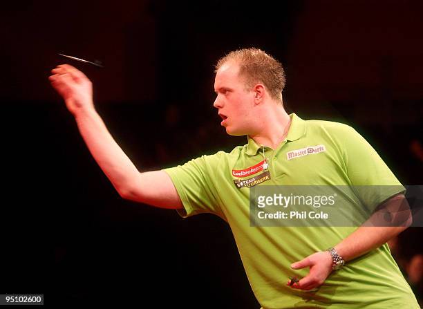 Michael van Gerwen of the Netherlands in action against Peter Wright of England during the 2010 Ladbrokes.com World Darts Championship Round One at...