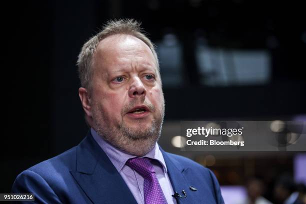 Andy Palmer, chief executive officer of Aston Martin Lagonda Ltd., speaks during a Bloomberg Television interview at the Beijing International...