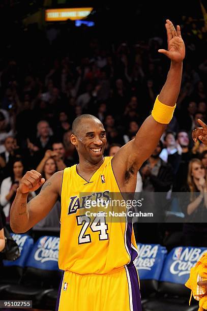 Kobe Bryant of the Los Angeles Lakers smiles after making the game winning shot against the Miami Heat on December 4, 2009 at Staples Center in Los...