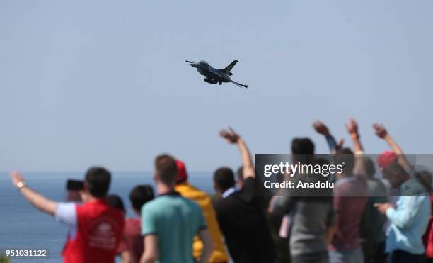 SoloTurk, the F-16 solo aerobatics display team of the Turkish Air Force, performs during the closure ceremony of 'March to the 57th Infantry...