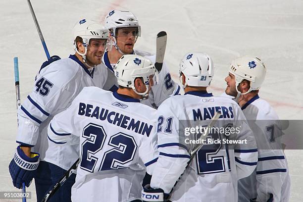 Viktor Stalberg, Colton Orr, Francois Beauchemin, Jamal Mayers and Ian White of the Toronto Maple Leafs celebrate a goal during the game against the...