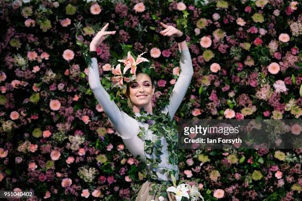 Dancer Alison Parsons poses in a floral display called Greenhouse during staging day for the Harrogate Spring Flower Show on April 25, 2018 in...