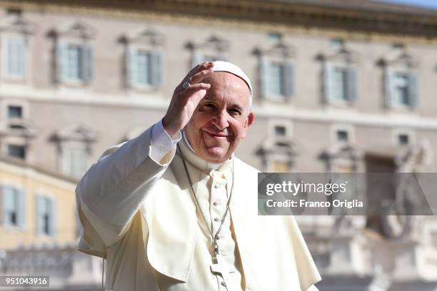 Pope Francis waves to the pilgrims gathered in St. Peter's Square for the general audience on April 25, 2018 in Vatican City, Vatican. At last week's...