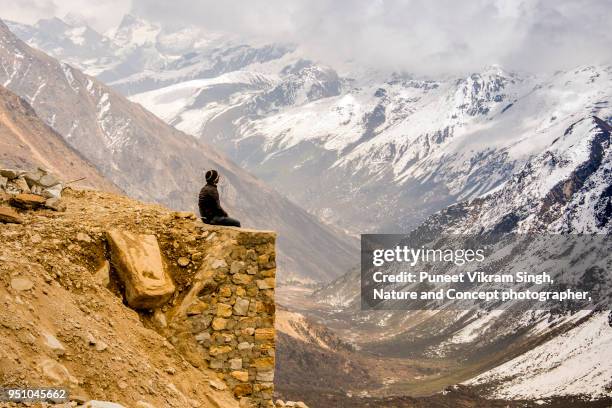 sitting in solitude against the mountain - northeast india stock pictures, royalty-free photos & images