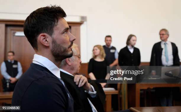 Borussia Dortmund goalkeeper Roman Buerki and Alfons Becker , the lawyer of Borussia Dortmund sit at the witness box as defendant Sergej W. Is...