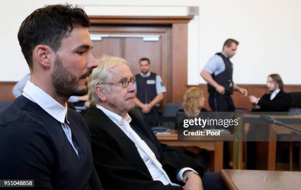 Borussia Dortmund goalkeeper Roman Buerki and Alfons Becker , the lawyer of Borussia Dortmund sit at the witness box as defendant Sergej W. Is...
