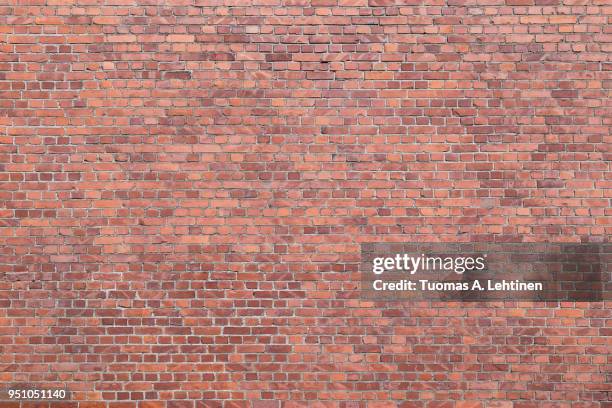 big full frame background of detailed old red brick wall with copy space - pared de ladrillos fotografías e imágenes de stock