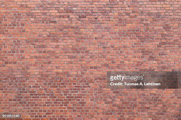 big full frame background of detailed old red brick wall with copy space - brick wall stock pictures, royalty-free photos & images