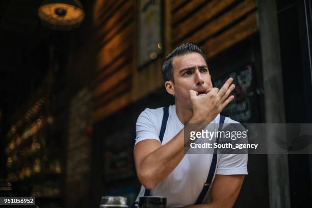 guy whistling - whistle stock pictures, royalty-free photos & images
