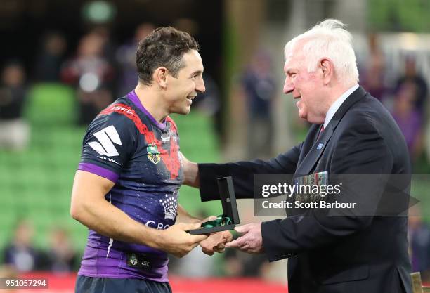 Billy Slater of the Melbourne Storm is presented with the Anzac Medal for best on ground after the round eight NRL match between the Melbourne Storm...