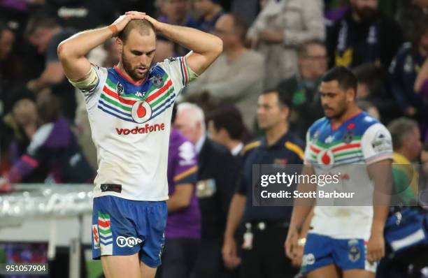 Simon Mannering of the Warriors and his teammates react at full time after losing the round eight NRL match between the Melbourne Storm and New...