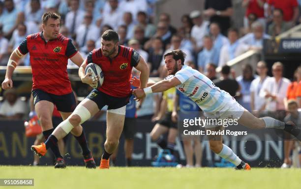 Sammy Arnold of Munster moves away from Maxime Machenaud during the European Rugby Champions Cup Semi-Final match between Racing 92 and Munster Rugby...