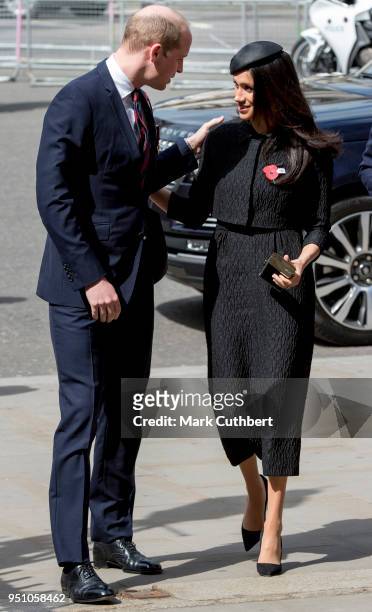 Prince William, Duke of Cambridge greets Meghan Markle as they attend an Anzac Day service at Westminster Abbey on April 25, 2018 in London, England.