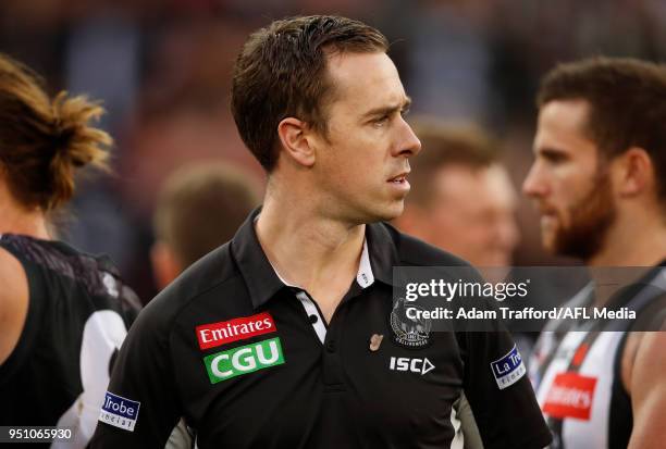 Nick Maxwell, Assistant Coach of the Magpies looks on during the 2018 AFL round five ANZAC Day match between the Collingwood Magpies and the Essendon...
