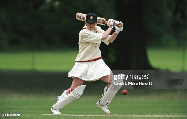 Batsman Charlotte Edwards cuts a ball towards the boundary during a match at Lilleshall on May 24, 1997 in England.