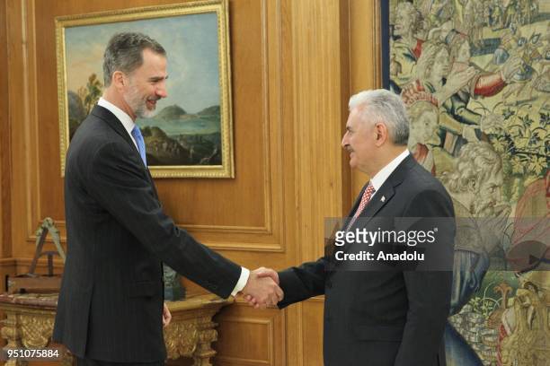 Turkish Prime Minister Binali Yildirim meets with Spain's King Felipe VI during his official visit at the Royal Palace of Madrid, Spain on April 25,...