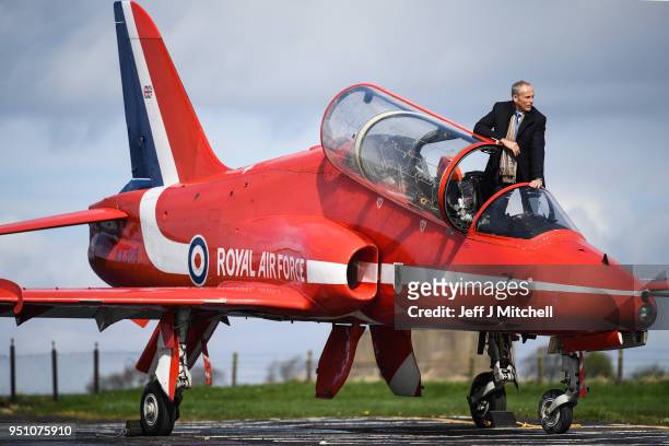 Simon Meade, former Red Arrows pilot, views a British Aerospace Hawk T1A which has been acquired by the national Museum of Scotland on April 25, 2018...