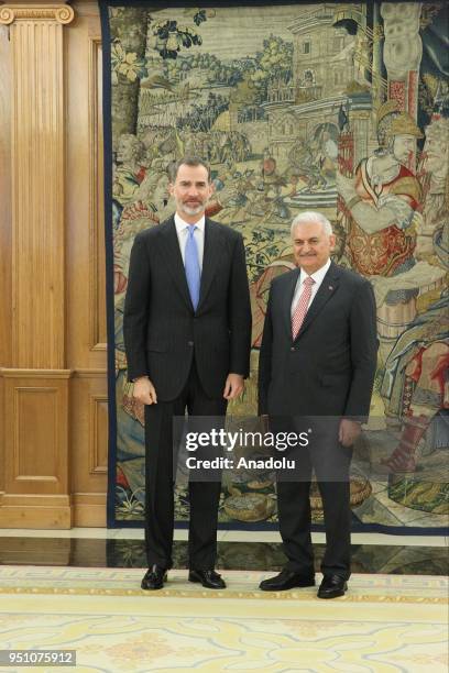 Turkish Prime Minister Binali Yildirim meets with Spain's King Felipe VI during his official visit at the Royal Palace of Madrid, Spain on April 25,...