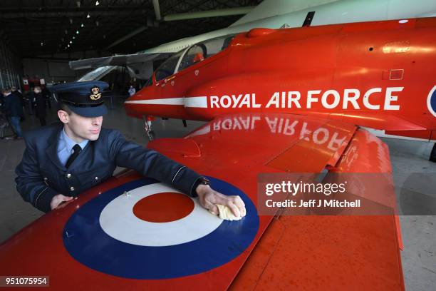 Flying officer Simon Bagshaw cleans a British Aerospace Hawk T1A which has been acquired by the national Museum of Scotland on April 25, 2018 in East...