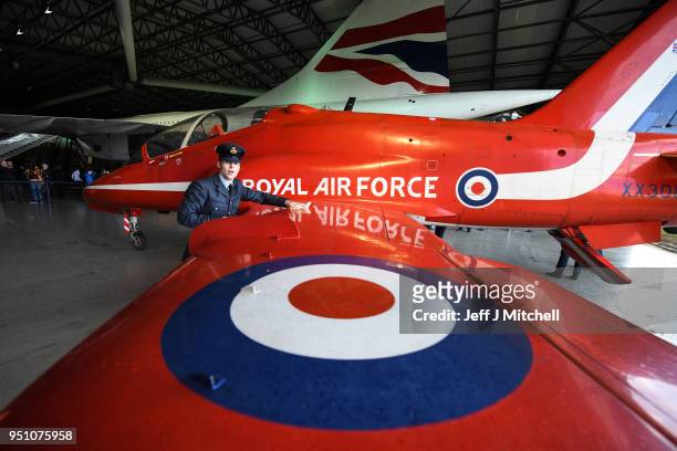 Flying officer Simon Bagshaw cleans a British Aerospace Hawk T1A which has been acquired by the national Museum of Scotland on April 25, 2018 in East...