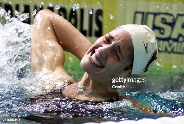 Kristy Kowal celebrates after breaking the US record in the woman's 200-meter breaststroke final at the 2000 United States Olympic Swim Trials at the...