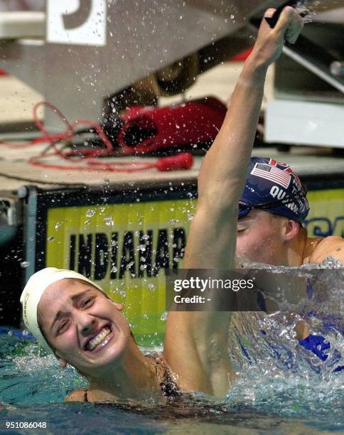 Kristy Kowal of the Athens Bulldogs pumps her fist in the air after winning the women's 200-meter breaststroke of the 2000 United States Olympic Swim...